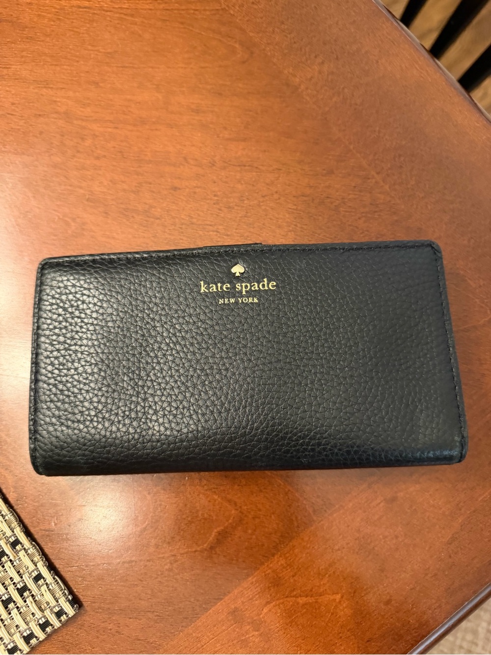 kate spade Black Pebbled Leather Continental Wallet with Gold Logo